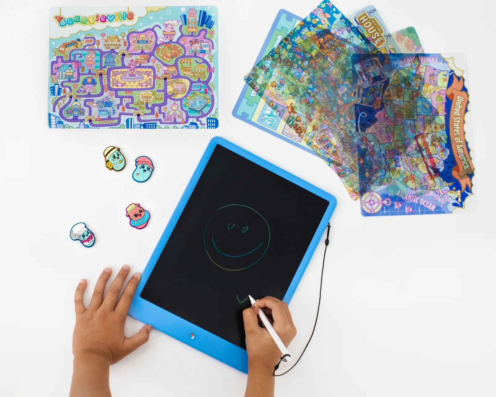 Child drawing directly on the Beansie play board
